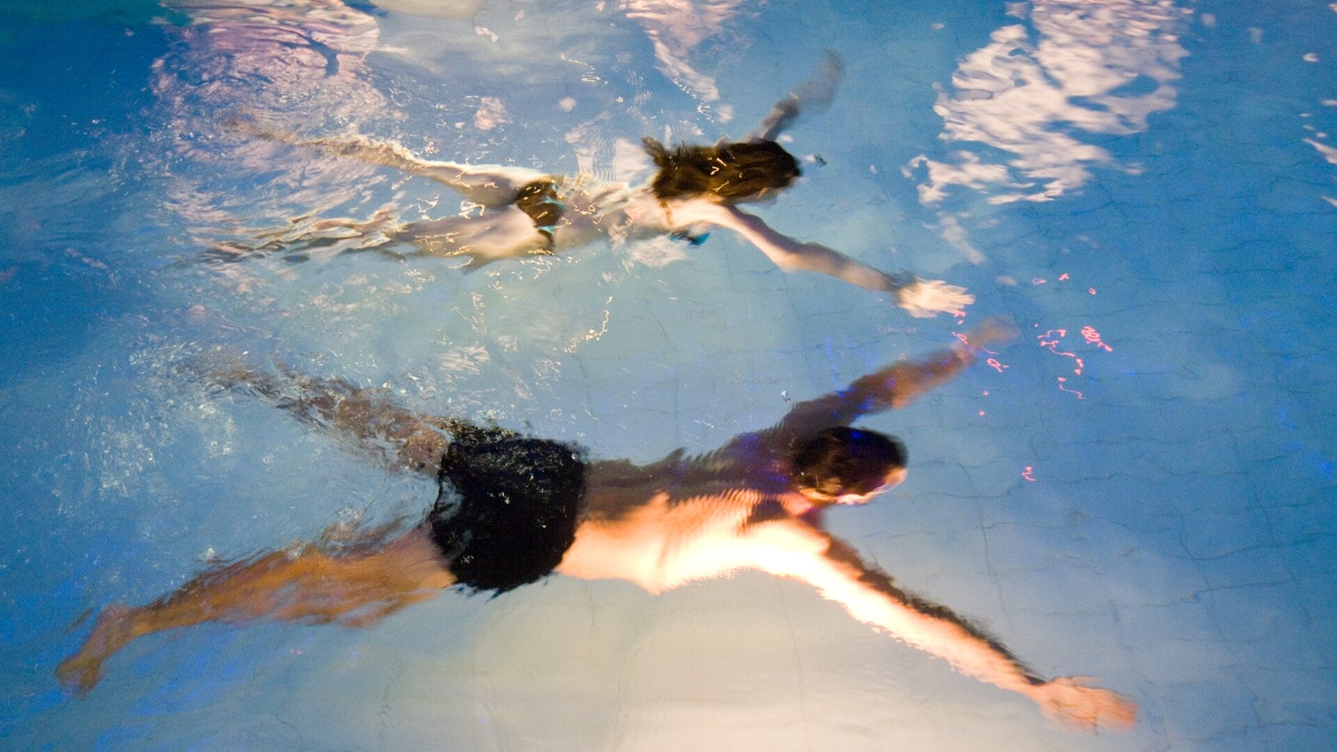 Image 2 A couple relaxing in a pool